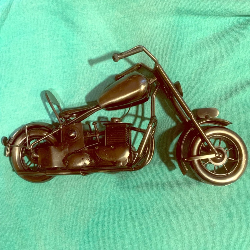 Hi, it’s your new metal motorcycle sculpture, duh!